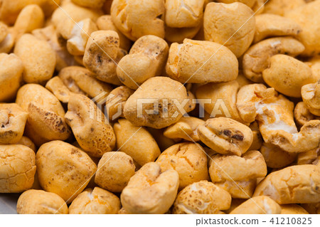 Roasted soft corn snack isolated on white Roasted soft corn snack isolated on white 41210825