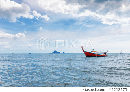 traditional thailand longtail boats, tropical sea traditional thailand longtail boats, tropical sea 41212575