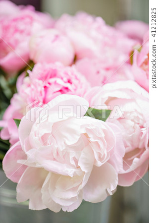 Lovely flowers in glass vase. Beautiful bouquet of pink peonies . Floral composition, scene 41212825