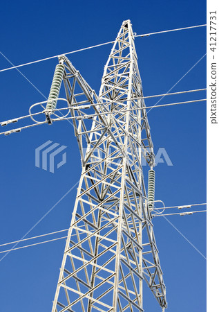 Winter hoarfrost ice covered  electricity tower 41217731