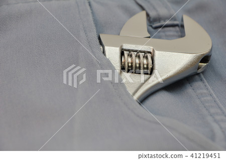 Monkey wrench in working pants pocket 41219451