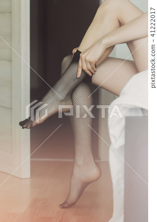 Naked woman wearing black stockings Naked woman wearing black stockings 41222017