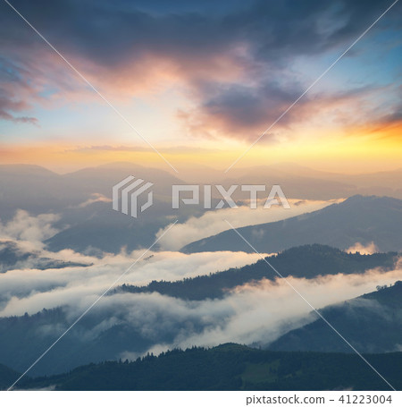 Mountain valley during sunrise Mountain valley during sunrise 41223004