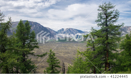 Young volcano among the mountains and field of frozen lava, Russia, Siberia, Eastern Sayan. 41224445