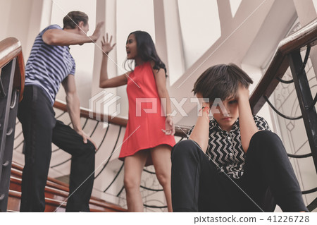 The concept of parental family quarrels, Young Couple Parents ar The concept of parental family quarrels, Young Couple Parents ar 41226728