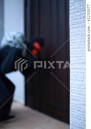 One man (Residential invasion thief crime criminal illegal culprit villain stolen cigarette hat disguised suspect case criminal) 41232077