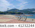 Shimanami Kaido Fashionable Mikkusutemu cross bike against the sea of Okata Beach 41232244