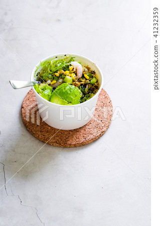 Green salad to go in white paper bowl Green salad to go in white paper bowl 41232359