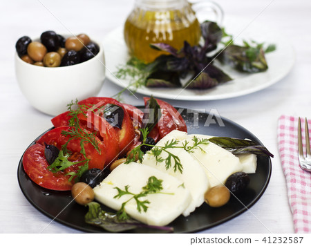 White cheese with tomatoes, green and black olives 41232587