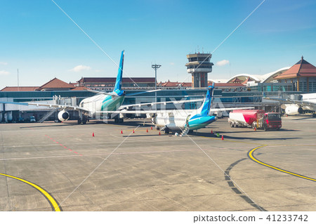 Airplanes at runway, Denpasar airport, Bali 41233742