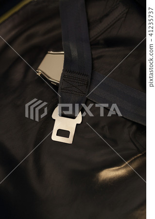Seat belt on seat shot in airplane. Seat belt on seat shot in airplane. 41235737