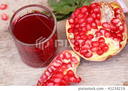 pomegranate fruit with juice pomegranate fruit with juice 41238219