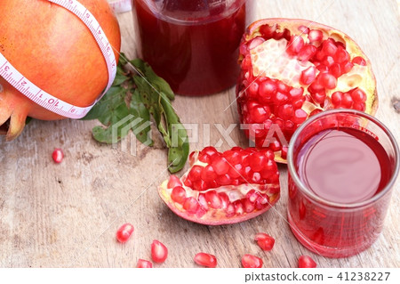 pomegranate fruit with juice pomegranate fruit with juice 41238227