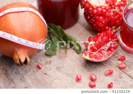 pomegranate fruit with juice pomegranate fruit with juice 41238229