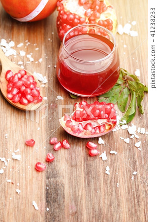 pomegranate fruit with juice pomegranate fruit with juice 41238233