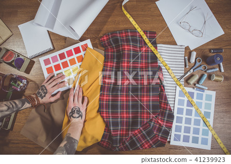 Man arms working with palette and fabric 41239923