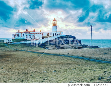 Old lighthouse, tower on thin spit of island 41244442
