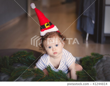 little white baby boy in Santa Claus hat little white baby boy in Santa Claus hat 41244814