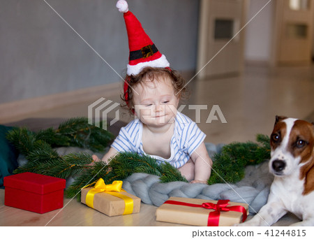 little white baby boy in Santa Claus hat 41244815