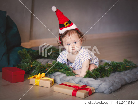 little white baby boy in Santa Claus hat little white baby boy in Santa Claus hat 41244816