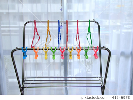 Room drying in a rainy day - with colorful hanger and pinch. 41246978