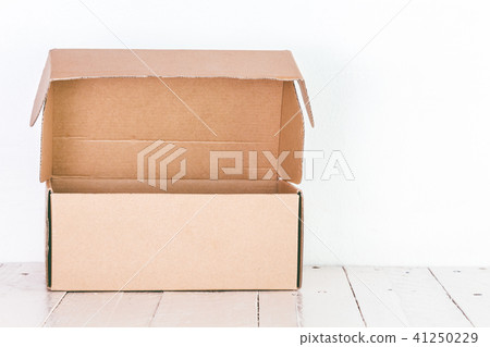 Box on wooden table Box on wooden table 41250229