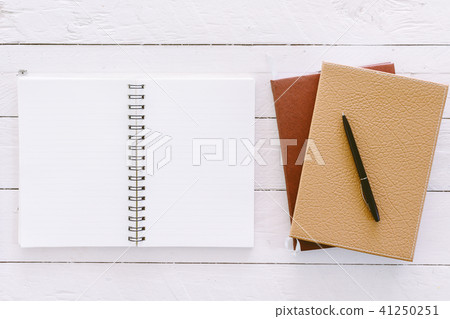Open blank notepad with empty white pages  41250251