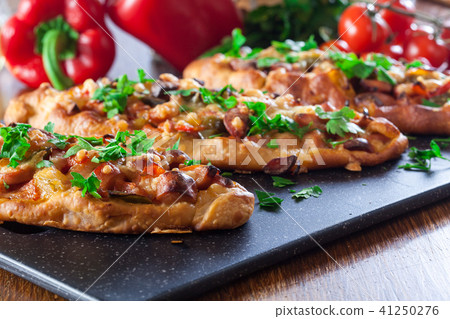 Traditional Turkish pide with meat and vegetables 41250276