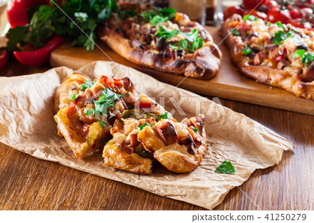 Traditional Turkish pide with meat and vegetables Traditional Turkish pide with meat and vegetables 41250279