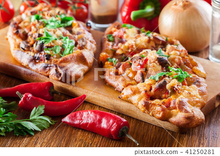 Sliced traditional Turkish pide with meat Sliced traditional Turkish pide with meat 41250281