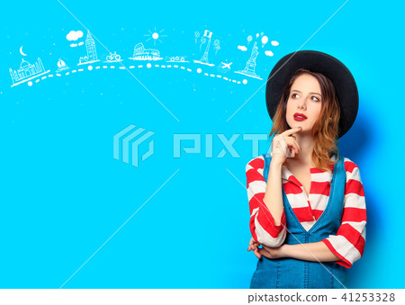 young smiling red-haired woman with travel route 41253328