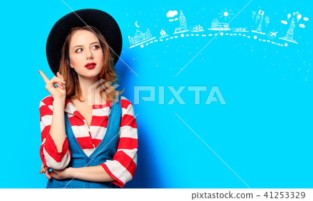 young smiling red-haired woman with travel route young smiling red-haired woman with travel route 41253329