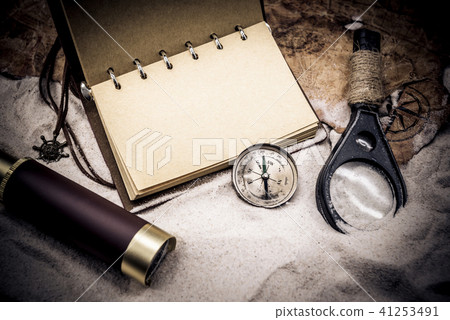 Columbus day. Pirates and treasure with worldmap  41253491
