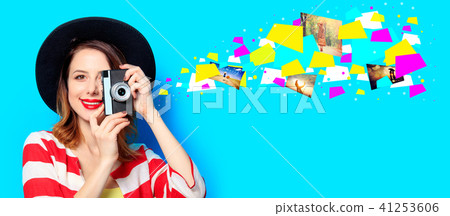 Woman with vintage camera Woman with vintage camera 41253606