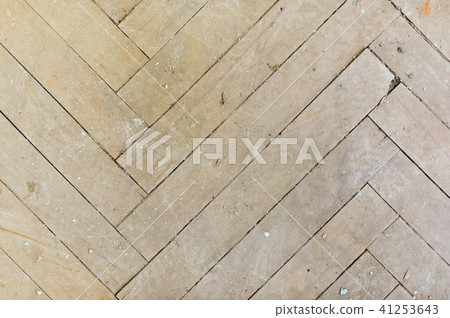 A close-up of an old gray faded parquet covered with dust and dirt. Result of repair. Cleaning and 41253643