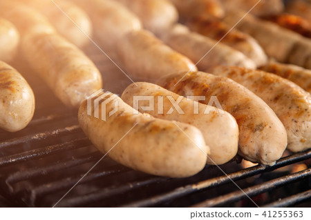 Grilled meat sausages on charcoal grill Grilled meat sausages on charcoal grill 41255363