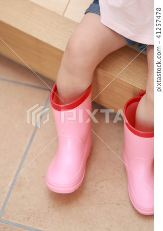 Boots (rain boots copy space no face out going child child rearing child rearing rainy weather bad weather rain gear) Boots (rain boots copy space no face out going child child rearing child rearing rainy weather bad weather rain gear) 41257478