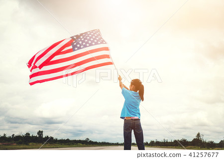 Happy kid little child standing with American flag 41257677