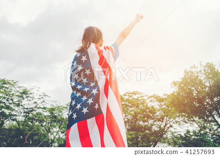 Happy kid little child standing with American flag Happy kid little child standing with American flag 41257693