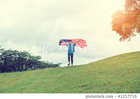 Happy kid little child running with American flag 41257710