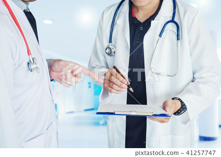 Two Doctor is talking about work in the hospital Two Doctor is talking about work in the hospital 41257747