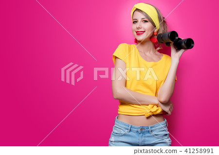girl holding binoculars girl holding binoculars 41258991