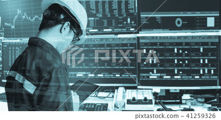 Double exposure of engineer man holding tablet 41259326