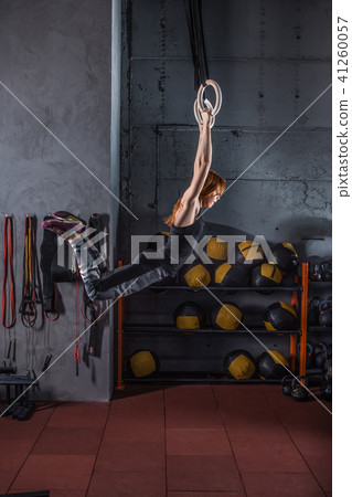Attractive woman working out in a gym Attractive woman working out in a gym 41260057