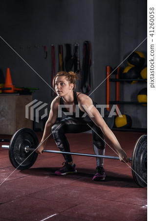 Attractive woman working out in a gym Attractive woman working out in a gym 41260058