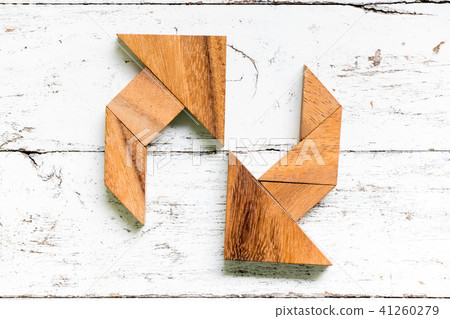 Tangram puzzle in circulate arrow shape Tangram puzzle in circulate arrow shape 41260279