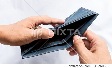 Wallet empty and no money hold in his hand Wallet empty and no money hold in his hand 41260636