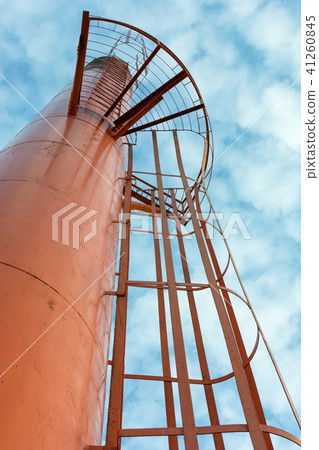 Low Angle View of Orange Water Tank. 41260845
