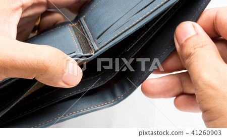 Wallet empty and no money hold in his hand Wallet empty and no money hold in his hand 41260903