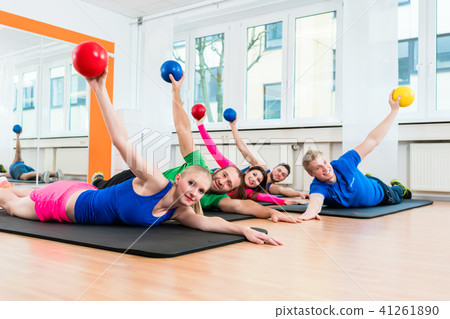 Workout group in gymnasium during physiotherapy  41261890